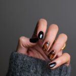 Short Black Nails: A Trendsetter's Guide to Timeless Elegance